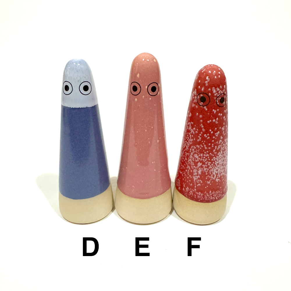 D is periwinkle top with darker blue body, E is pink with a few white spots, F is red with lots of white spots