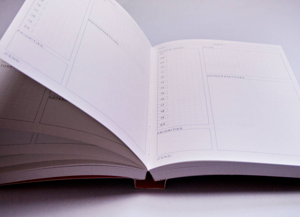 Daily Planner Book by The Completist