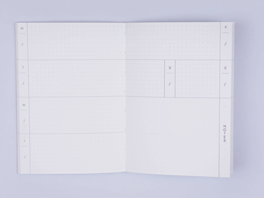 Pocket Weekly & Monthly Planner by The Completist