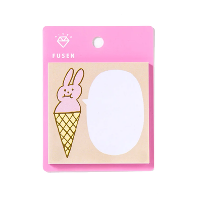 square sticky note with pink rabbit sticking out of an ice cream cone with a speech bubble for notes
