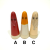 A is red with white drip, B is orange upper half white bottom half, C is peach with drippy top
