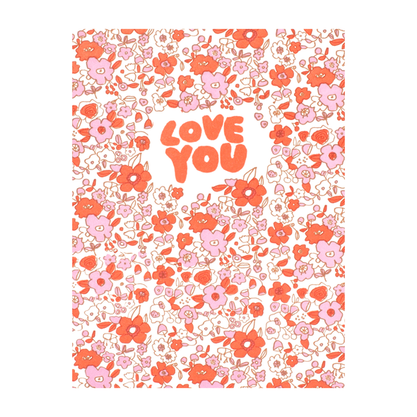 red, pink, and white flowers around red bubble letters that say LOVE YOU
