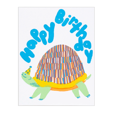Happy Birhtday in fun bubble letters over a turtle with a multi-colored shell and a party hat
