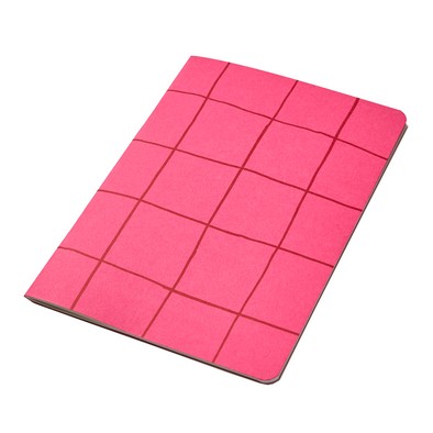 A5 notebook with rounded corners with pink cover that is printed with hand-drawn large red grid design