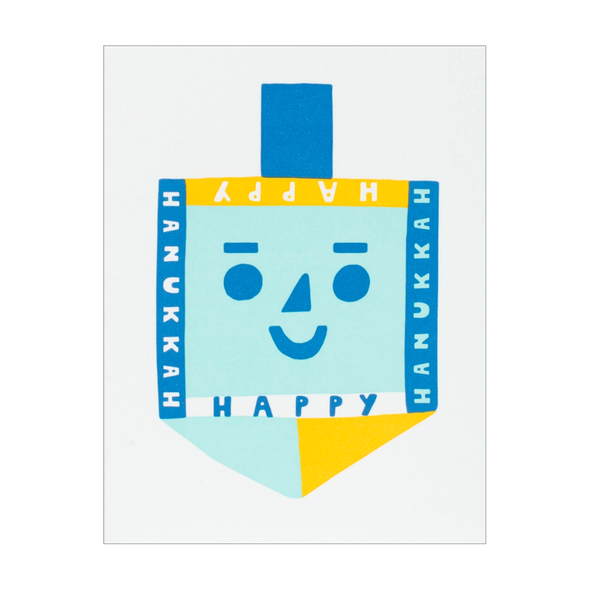 Smiley face dreidl with border reading HAPPY HANUKKAH