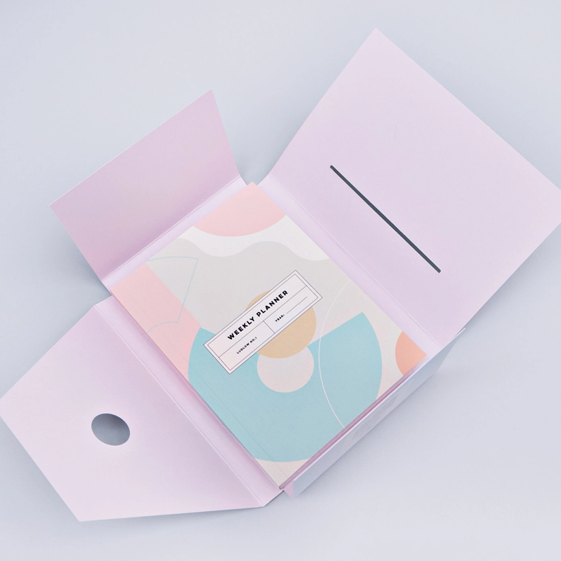 Pocket Weekly & Monthly Planner by The Completist