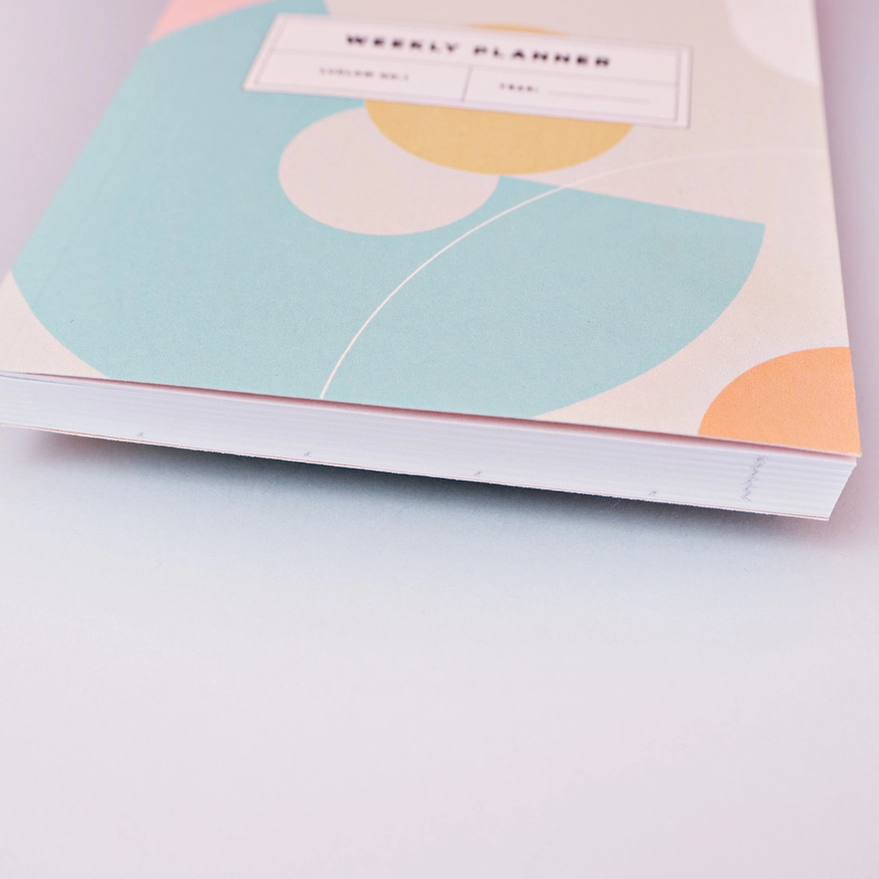 Pocket Weekly & Monthly Planner by The Completist
