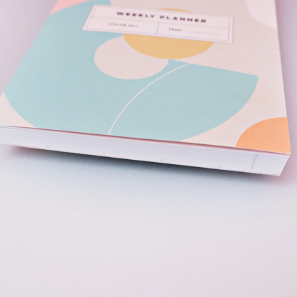 Pocket Weekly & Monthly Planner by The Completist