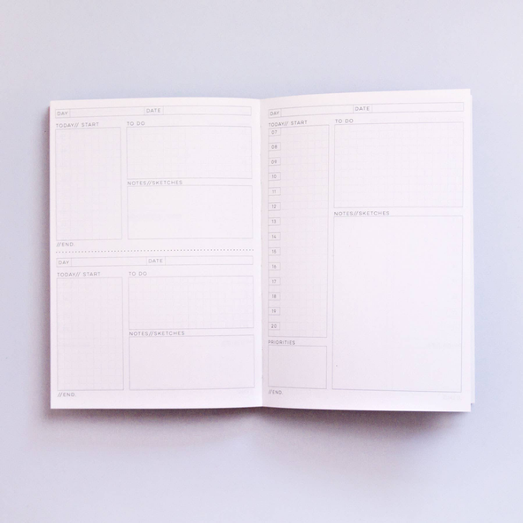 Daily Planner Book by The Completist