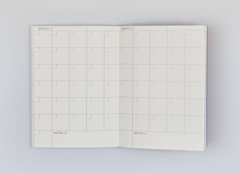 Pocket Weekly & Monthly Planner by The Completist