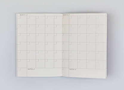 Pocket Weekly & Monthly Planner by The Completist