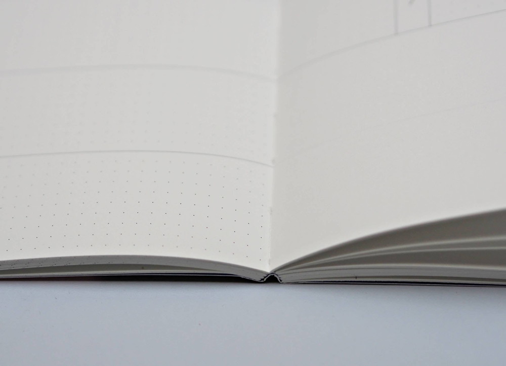 Pocket Weekly & Monthly Planner by The Completist
