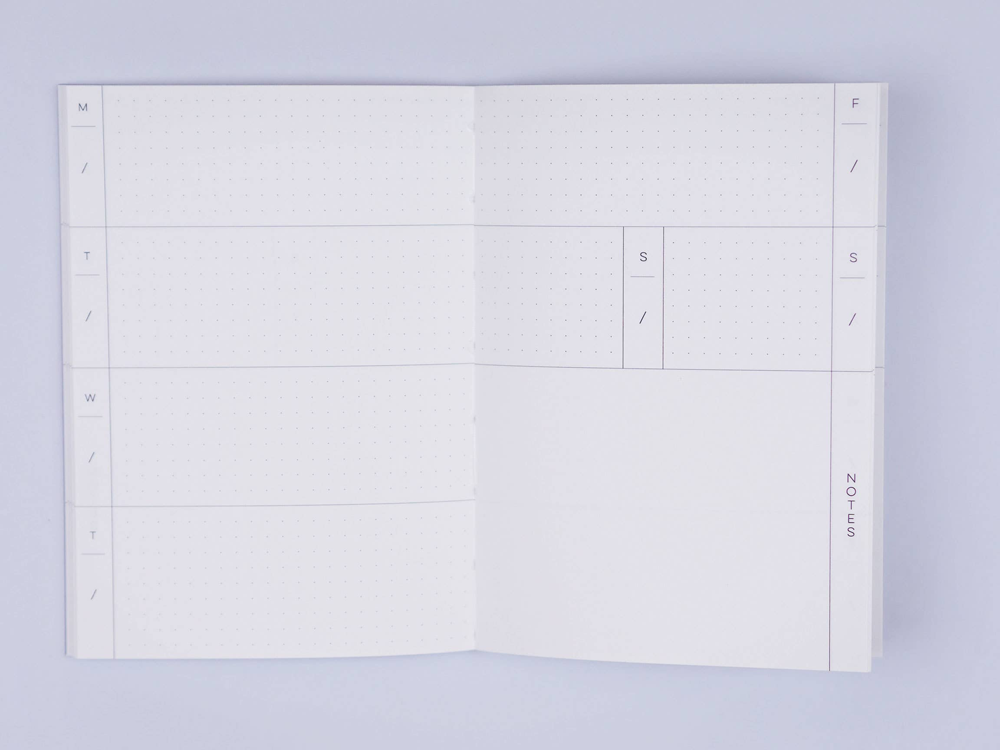 Pocket Weekly & Monthly Planner by The Completist