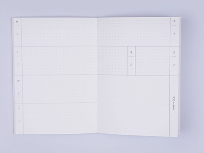 Pocket Weekly & Monthly Planner by The Completist