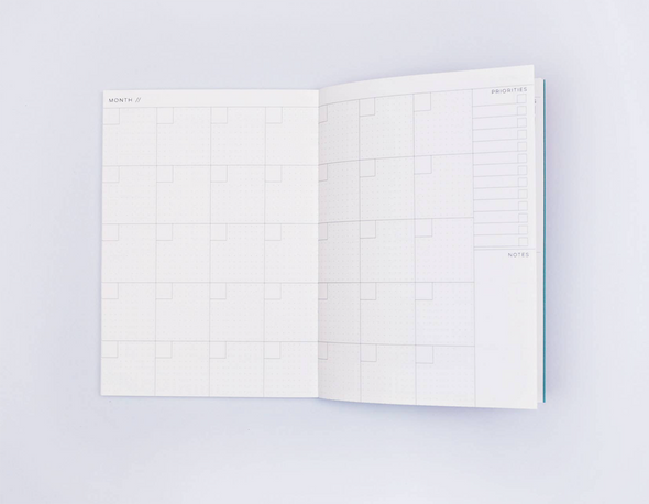 Weekly & Monthly Planner Book by The Completist