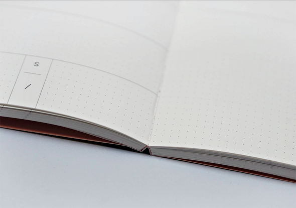 Weekly & Monthly Planner Book by The Completist